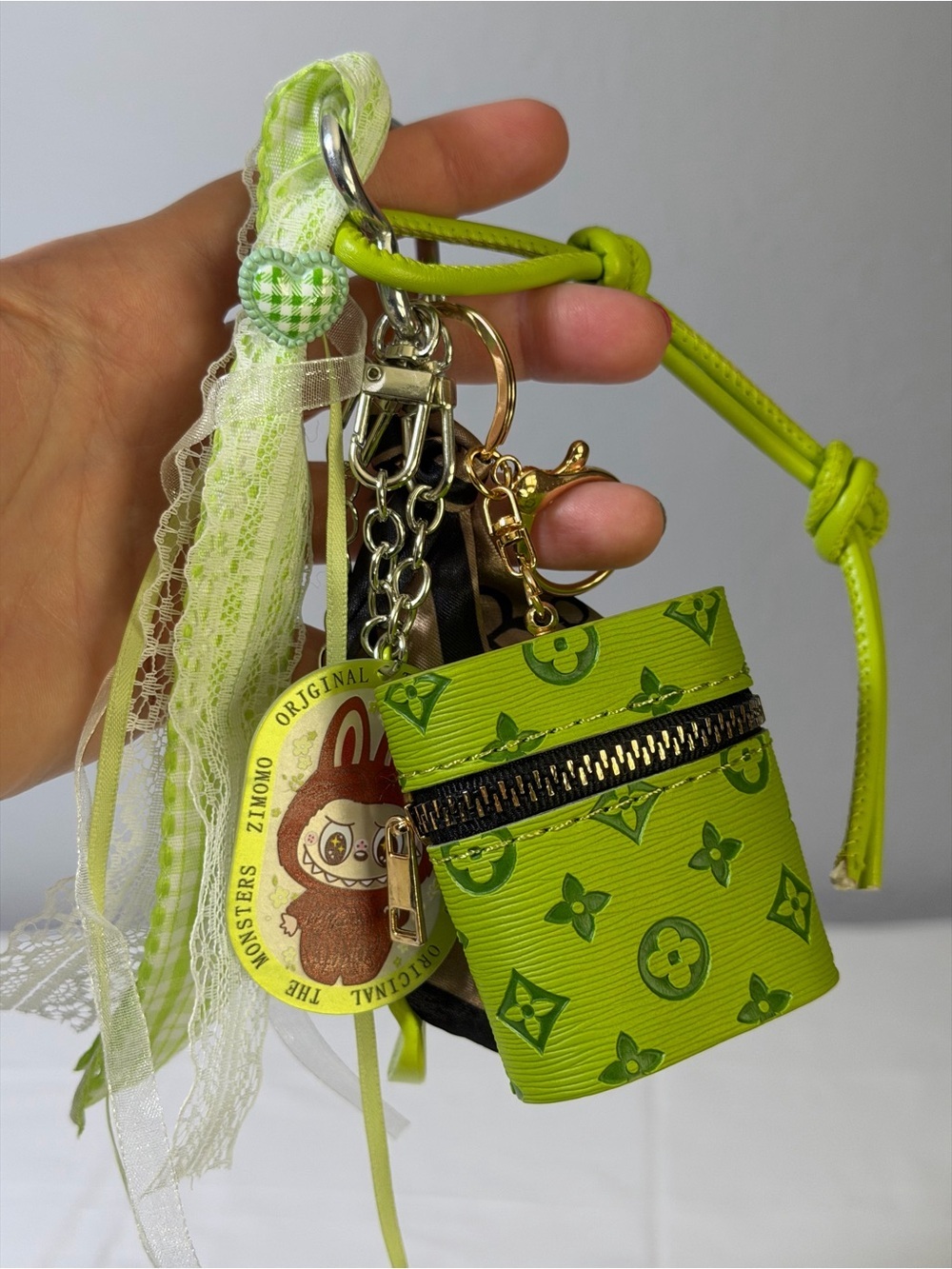 New bag key chain with pouch and multiple attachments